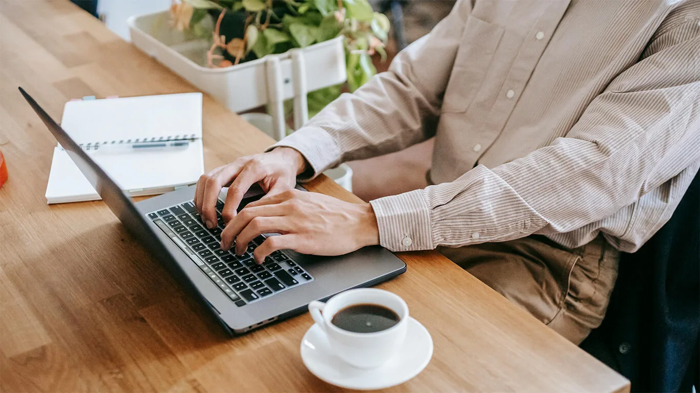 image shows person typing content