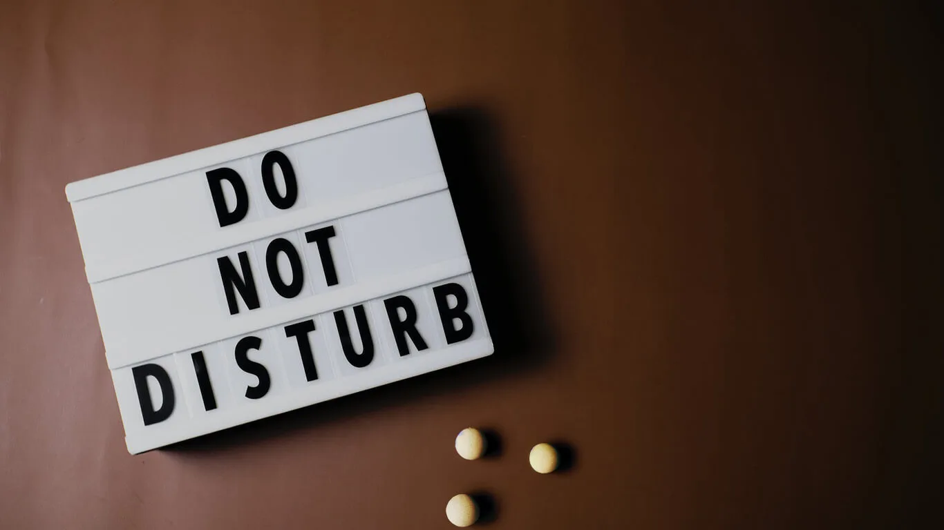 image shows a sign reading do not disturb