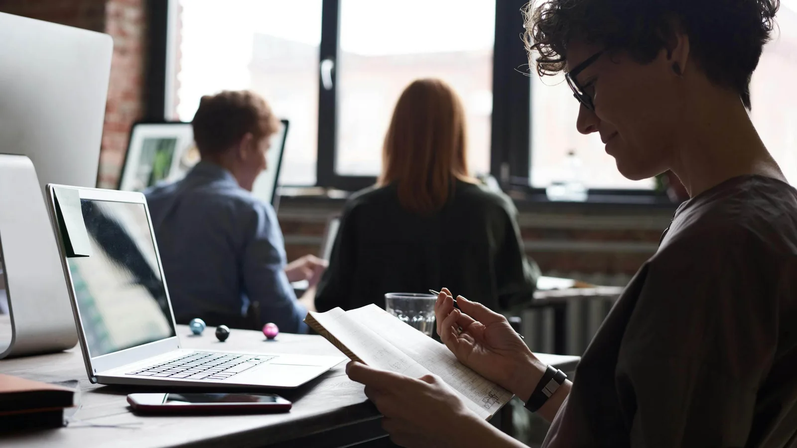image shows people developing a documentation strategy